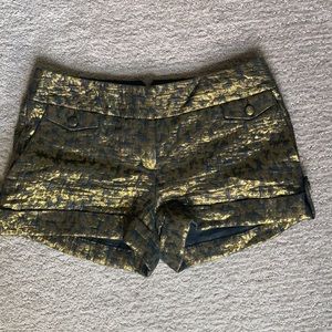 Gold and Black Express shorts size 2